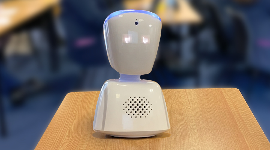 close up shot of av1 robot on a desk