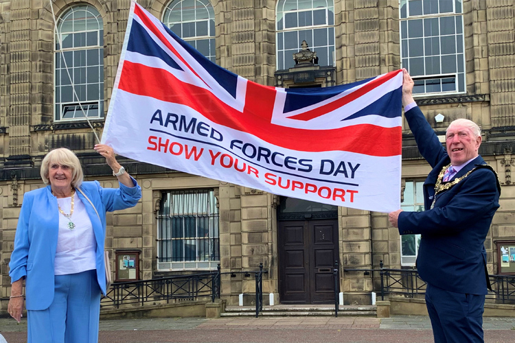Mayor and Mayoress of Wirral proudly raise the Armed Forces Day flag at Wallasey Town Hall