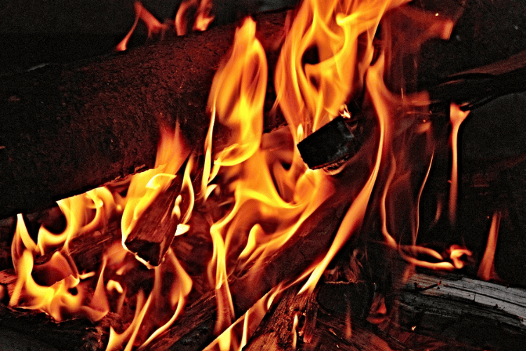Close up of orange flames of a bonfire