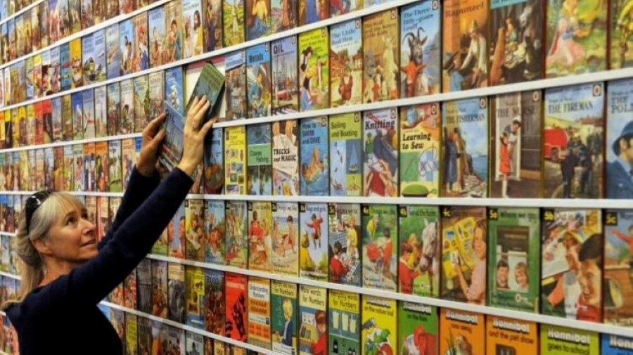 A wall of books at the Ladybird books exhibition