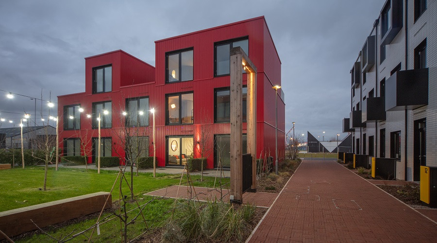 image of red coloured modular home at redbridge quay
