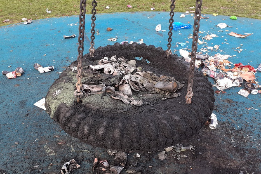 close up of a burned out tyre swing