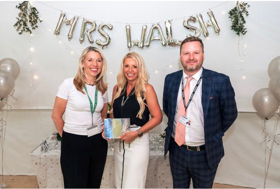 Lisa Walsh with her award alongside Nicky Cornford and James Backhouse  