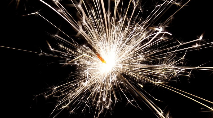 Close-up of a sparkler that is lit.