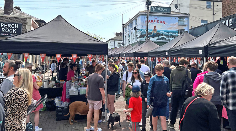 A shot showing a crowd of people at the market