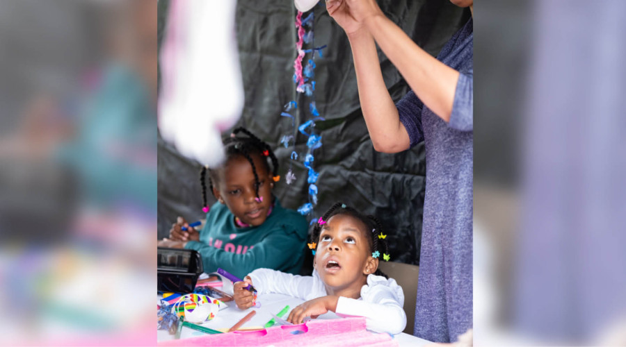 Young visitors enjoying the arts and crafts.