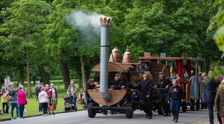 The people-powered rocket on its way through Birkenhead Park.