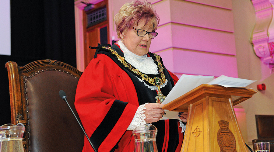 Photo of the Mayor reading at a lectern