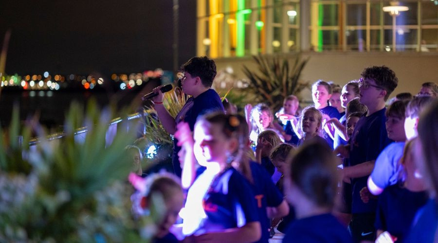 Photo of young people from Stage-Ed performing outside the Floral Pavilion