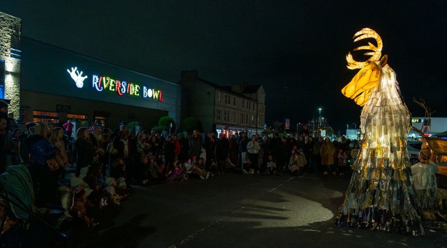 Photo of the Ghostly Caribou entertaining a large crowd on the Promenade