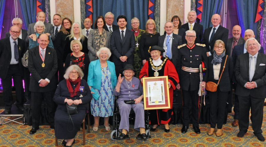 Photo of all guests at the scroll presentation