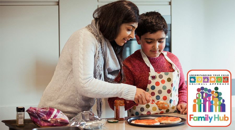 A mother and child cooking together