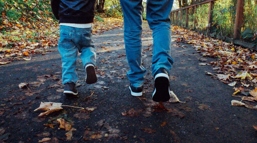 Parent and child walking
