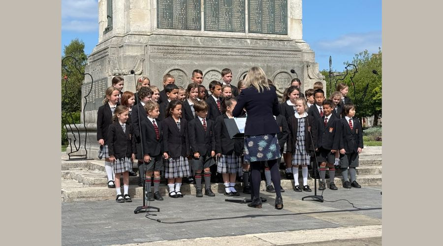 photo of the choir from Birkenhead School at the Cenotaph