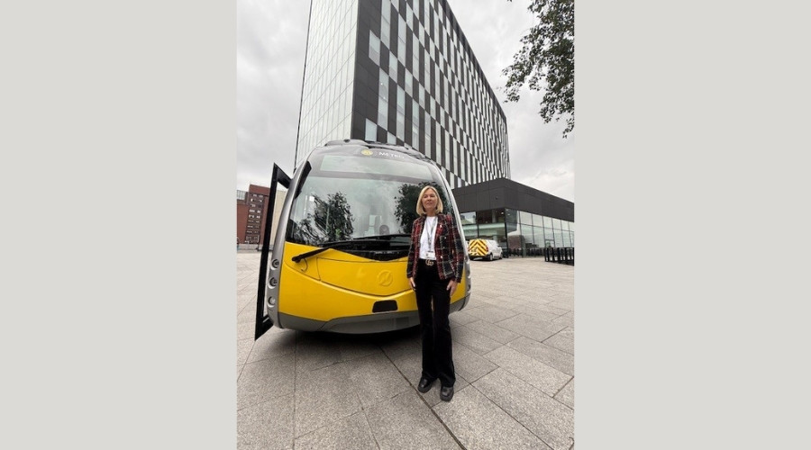 Photo of the Council Leader standing in front of The Glider