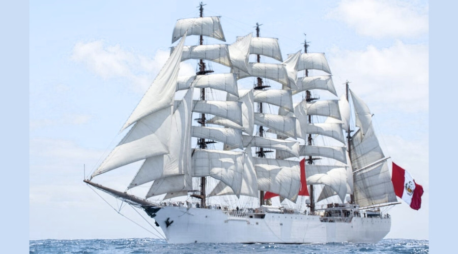 Photo of the BAP Union tall ship in full sail at sea on a sunny day