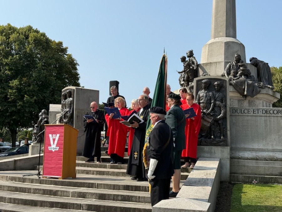 Photo of Revd. Alan Wickens and the choir of Christ Church at the service in Port Sunlight