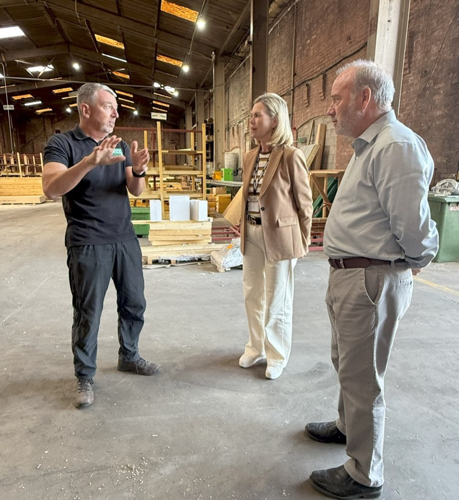 Centre Wirral Council Leader Cllr Paula Basnett visits SticX, a specialist structural timber company based in Wirral.