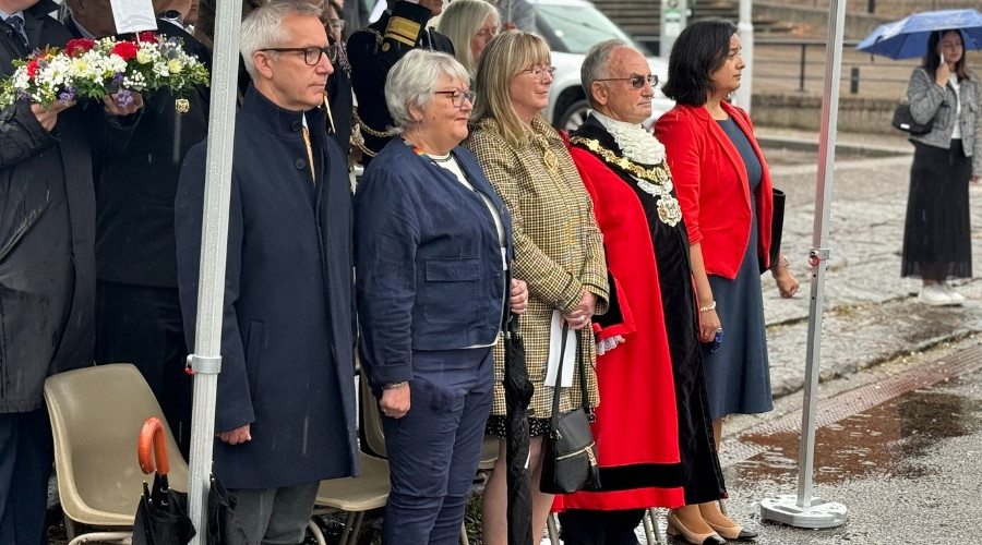 Photo of the Mayor and guests observing the ceremony on the Birkenhead waterfront