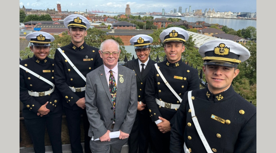 Photo of Wirral's heritage champion, Councillor Jerry Williams, with Navy Cadets