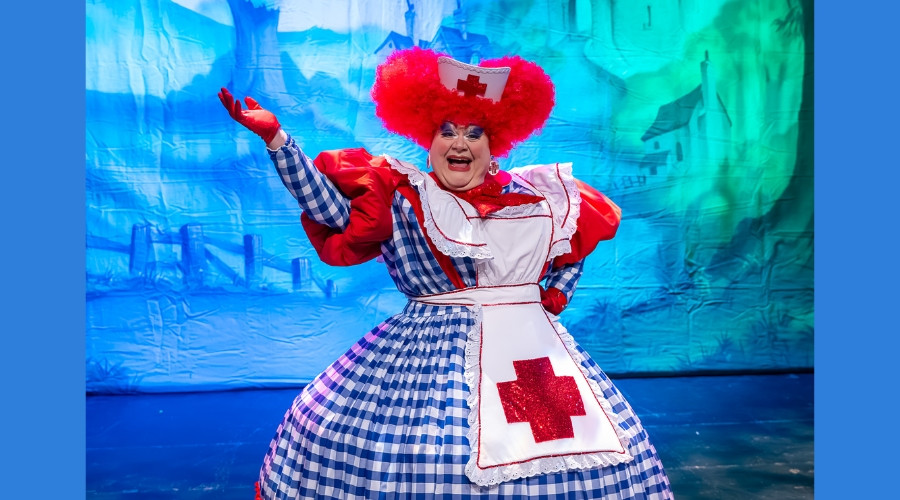 Photo of Quinn Patrick on stage in the outrageous costume of Nanny Nora