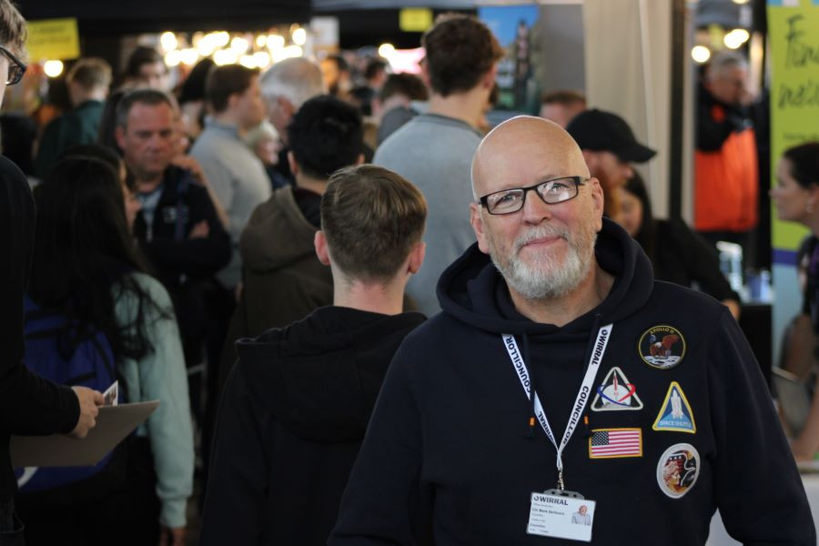 A picture of Cllr Mark Skillicorn standing in amongst crowds at the jobs fair