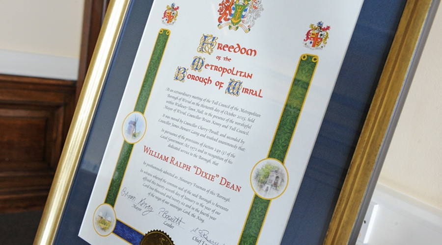 A photo showing the design and text of the citation on the scroll handed to the family of Dixie Dean
