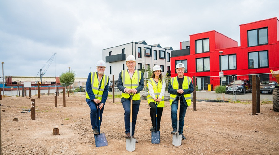 From left, each wearing PPE and holding a spade: Cllr Mark Skillicorn, James Wittaker, Lisa Forshaw and Lyndon Forshaw. Image courtesy of Peel Waters