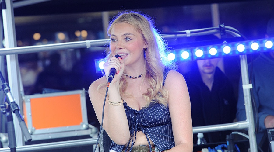 A singer performs at a previous Youth Market event