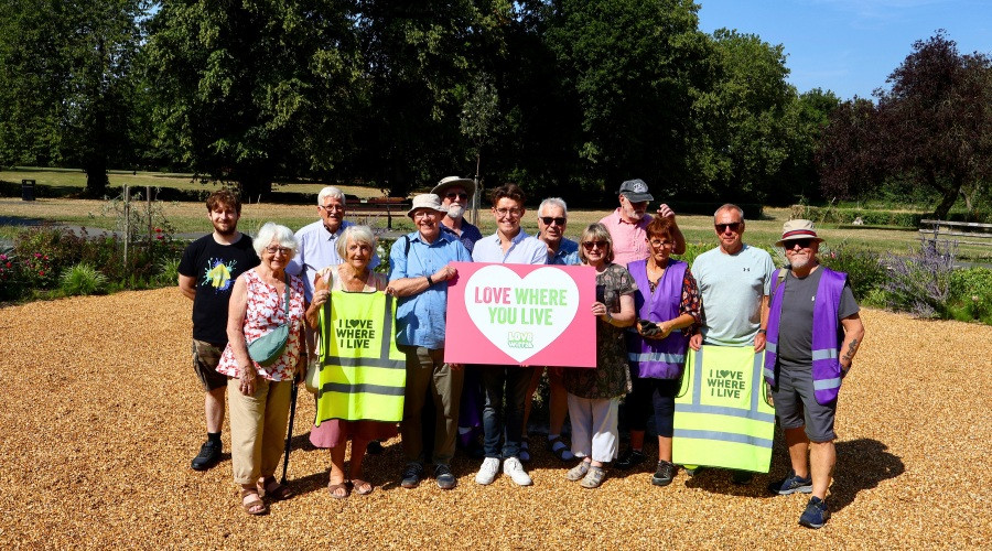 Cllr Max Booth pictured with volunteers from the Friends group at Mayer Park in Bebington