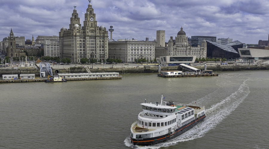 The royal daffodil ferry with Liver building in background
