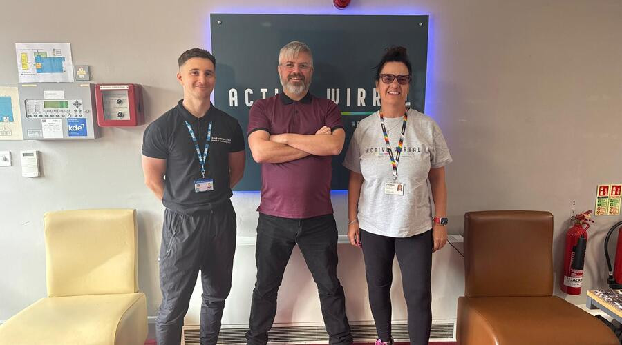 Kevin Martin, centre, who signed up to a We Are Undefeatable membership, with Callum Evans, left, a health and wellbeing coach, and , a health and wellbeing coach for Arno and Northcoast Alliance SDU, Primary Care Networks for Birkenhead and Wallasey, and Sonia Carty, part of Wirral Council's Active Wirral team. 
