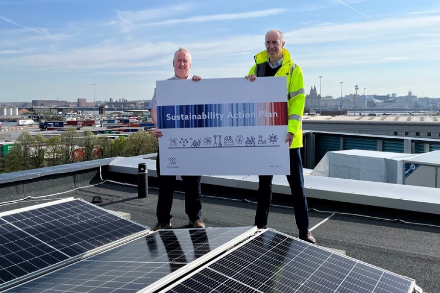 Peter Owen, Chair of the COOL Wirral Partnership, and Richard Mawdsley at a Photo Voltaic green energy array at Wirral Waters.