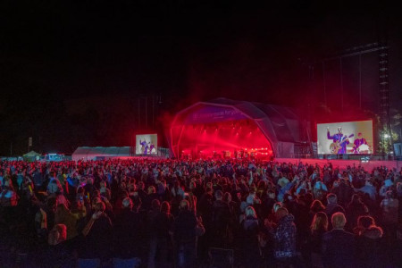 Crowd watching the stage during music performance at Wirral Food and Drink Festival 2019