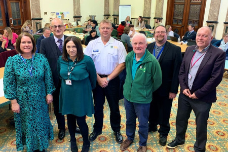 Wirral Council leader Janette Williamson with representatives from community and faith sectors and other organisations at Wirral Partnership Summit in Birkenhead town hall