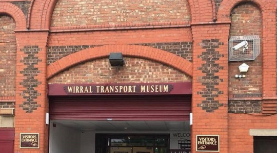 wirral transport museum shown from the main entrance. The words "Wirral Transport Museum" are visible above the door
