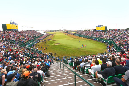 image of the  thousands of people in the grandstands around the 18th hole of Royal Liverpool Golf Club taken during The Open