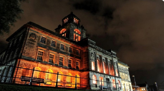 Wallasey town hall floodlit in orange light