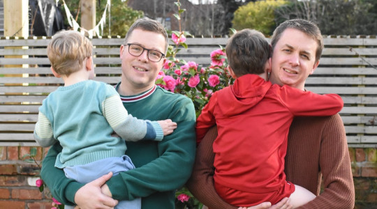 Matt and Joe with their adopted children 