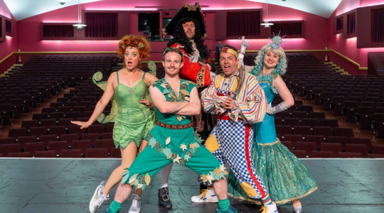 The cast of this year's panto pose for photo on the Floral stage