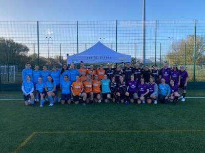 smiling women's football teams