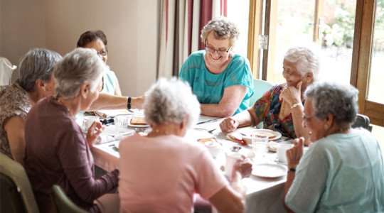 Care home residents at breakfast