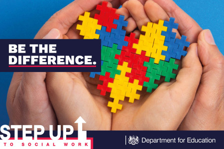 be the difference step up to social work graphic with a lego heart in a pair of hands