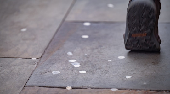Stock image of dried chewing gum on a pavement