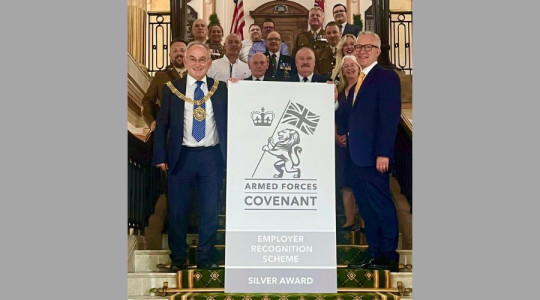 Photo of the mayor and mayoress of Wirral and acting chief executive of the Council, Jason Gooding, celebrated achieving the ERS Silver Award with representatives from Wirral's Armed Forces community.