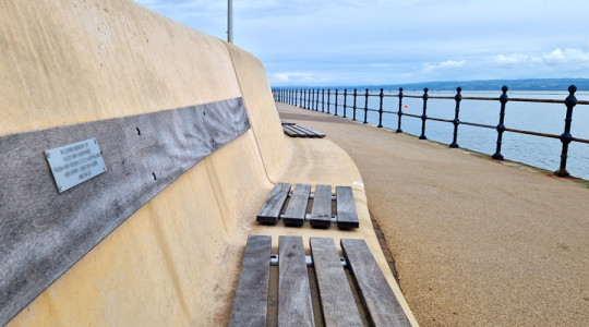 An example of a plaque on the flood wall at West Kirby