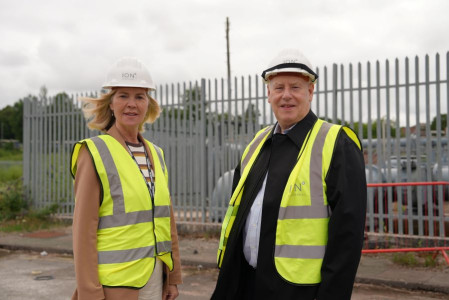 Leader of Wirral Council Cllr Paula Basnett stands with Steve Parry, Managing Director at ION Developments, on site at Hind Street in front of the former gasworks