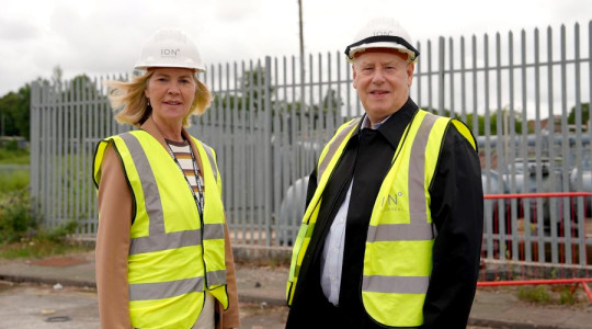 Leader of Wirral Council Cllr Paula Basnett stands with Steve Parry, Managing Director at ION Developments, on site at Hind Street in front of the former gasworks