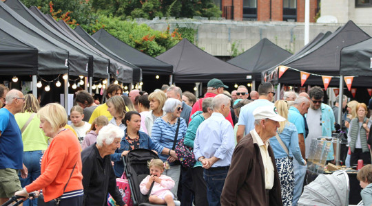Photo of a very busy street market