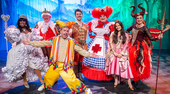 A photo of the cast of Sleeping Beauty posing on the theatre stage